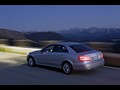 2010 Mercedes-Benz E-Class Sedan  - Rear Left Quarter View Photo
