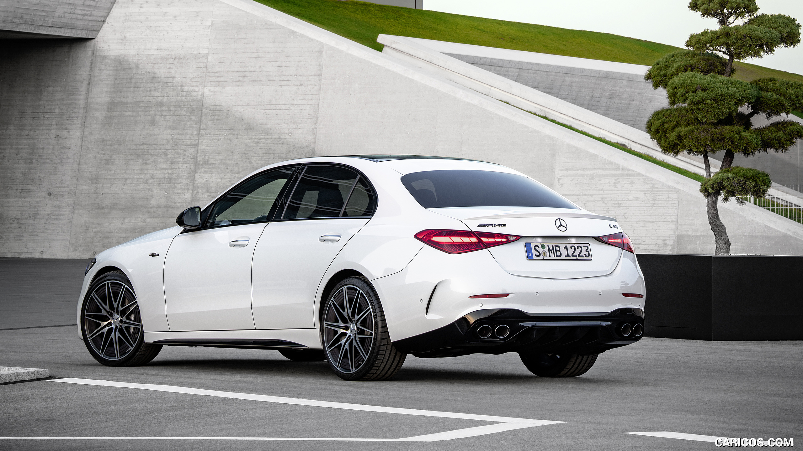 2023 Mercedes-AMG C 43 4MATIC (Color: Opalite White) - Rear Three-Quarter, #13 of 31