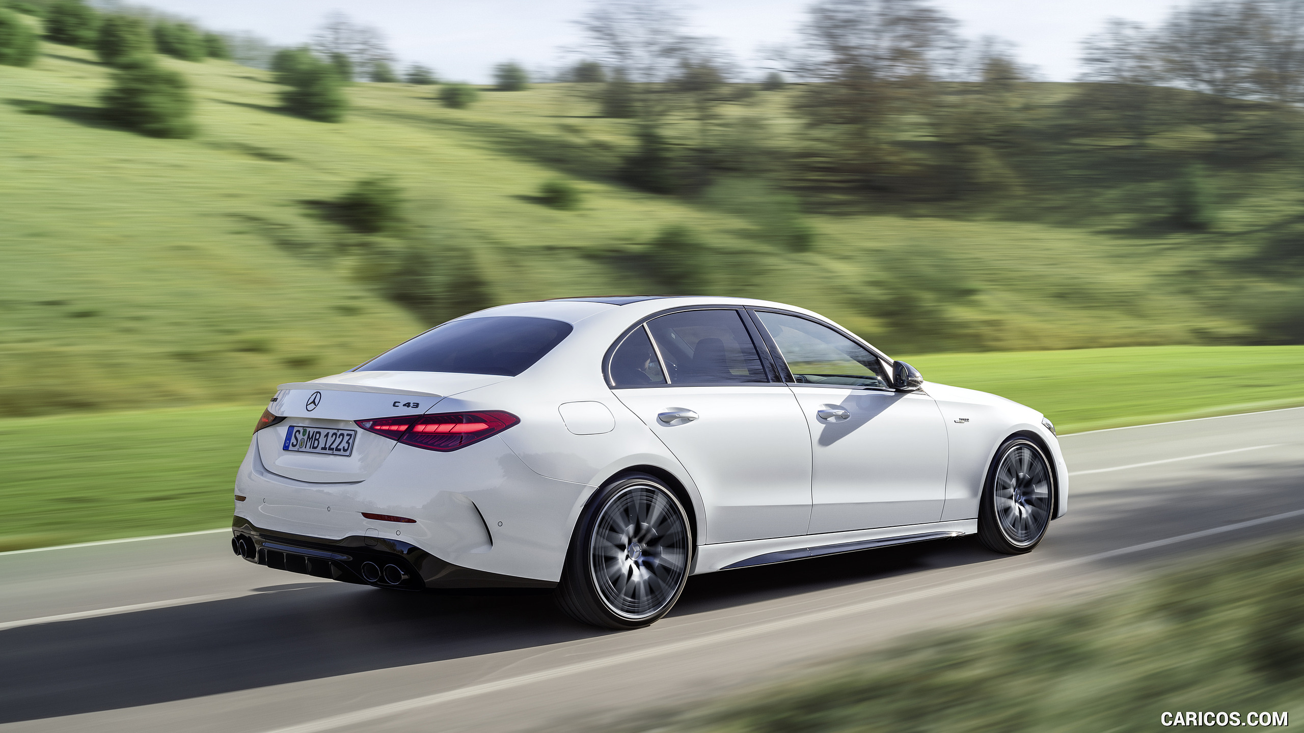 2023 Mercedes-AMG C 43 4MATIC (Color: Opalite White) - Rear Three-Quarter, #3 of 31