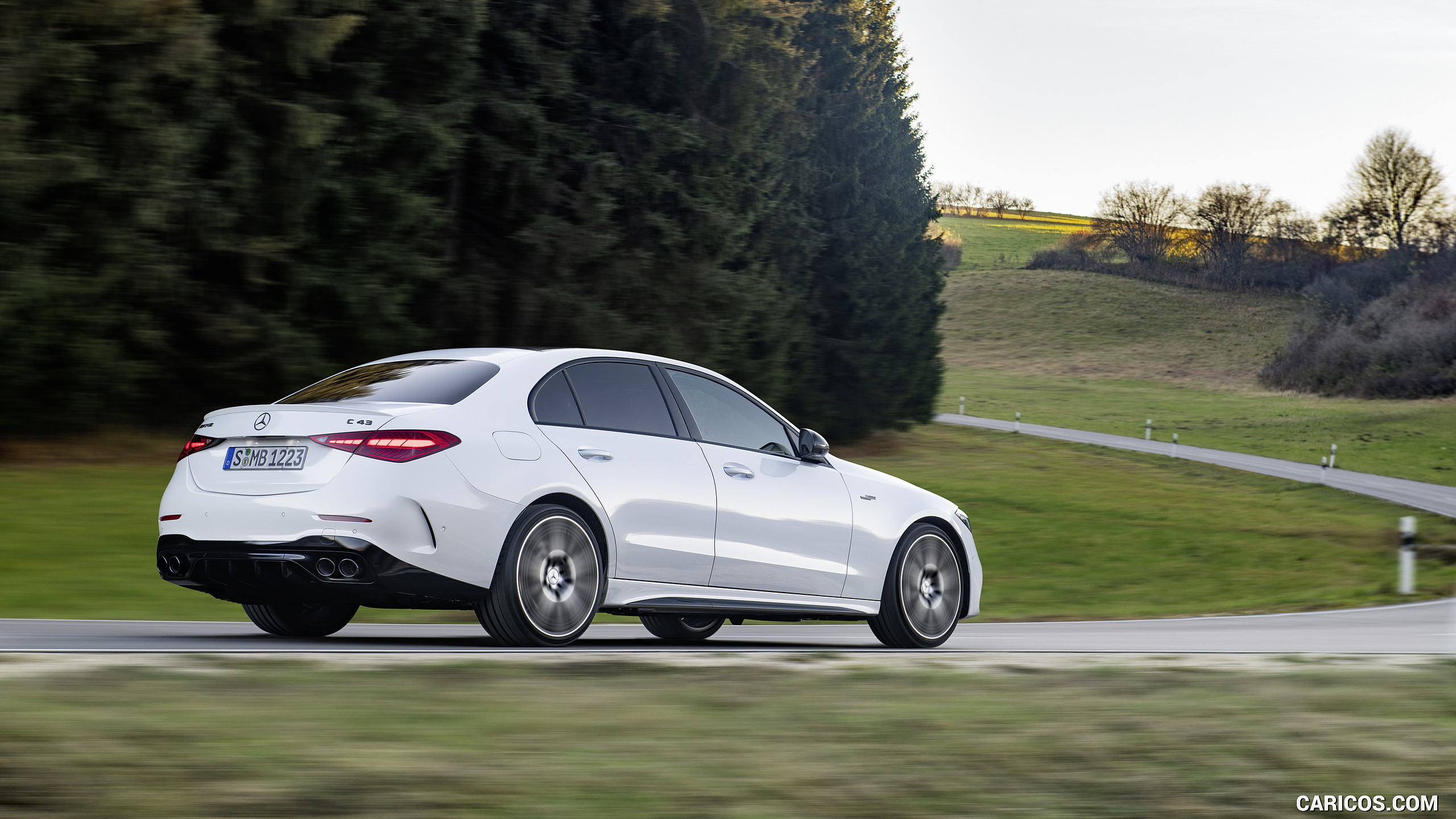 2023 Mercedes-AMG C 43 4MATIC (Color: Opalite White) - Rear Three-Quarter, #5 of 31